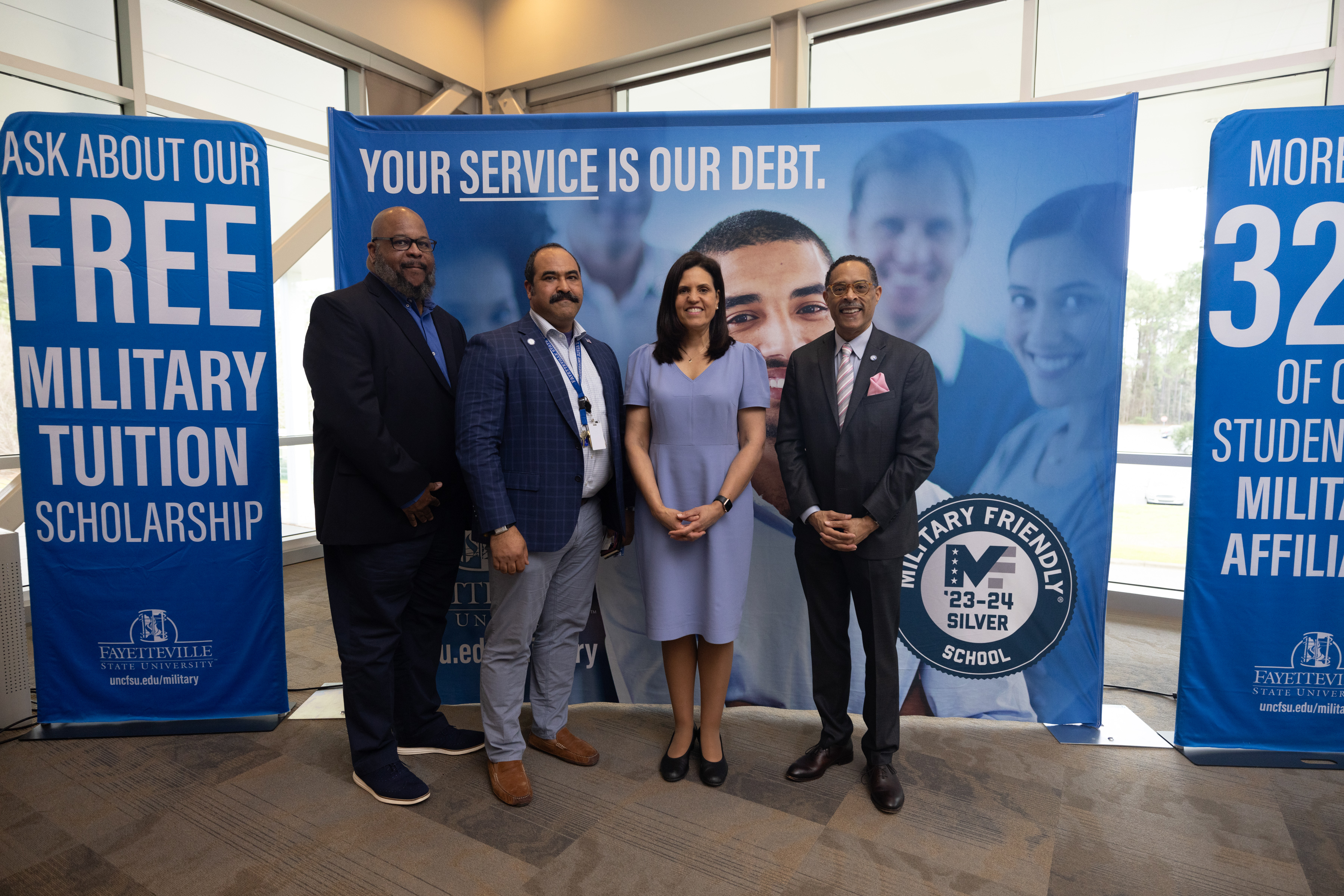 Far left to right, Dr. Dennis Corbin, Interim Associate Dean for the School of Social Work, Lieutenant Colonel (Ret.) Michael Alexander, Associate Vice Chancellor (AVC) for Military Relations, Deputy Secretary Bradsher, and Dr. Marcus Cox, Dean of the College of Humanities and Social Sciences.