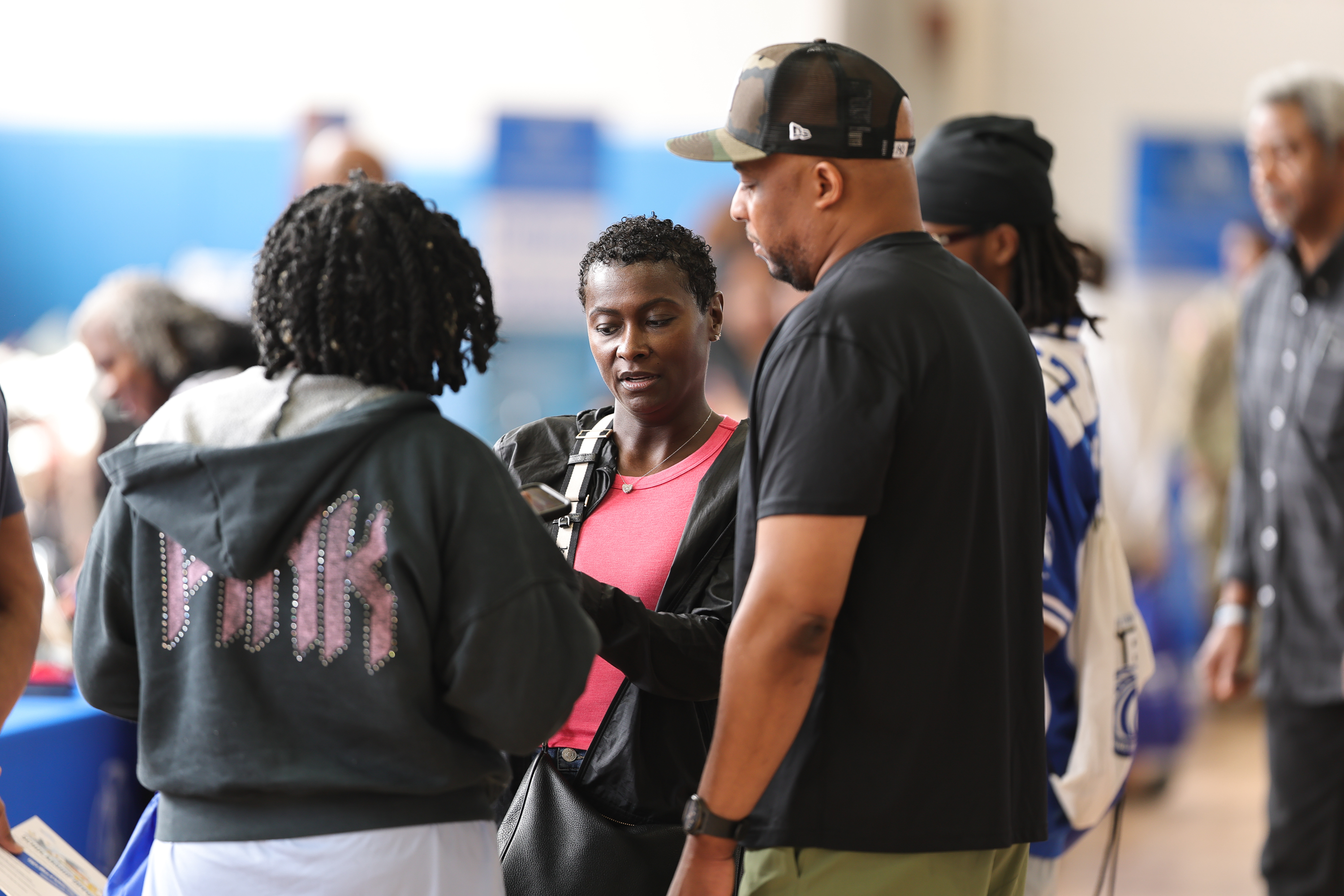 Bronco families laughing together during a Fayetteville State University family event