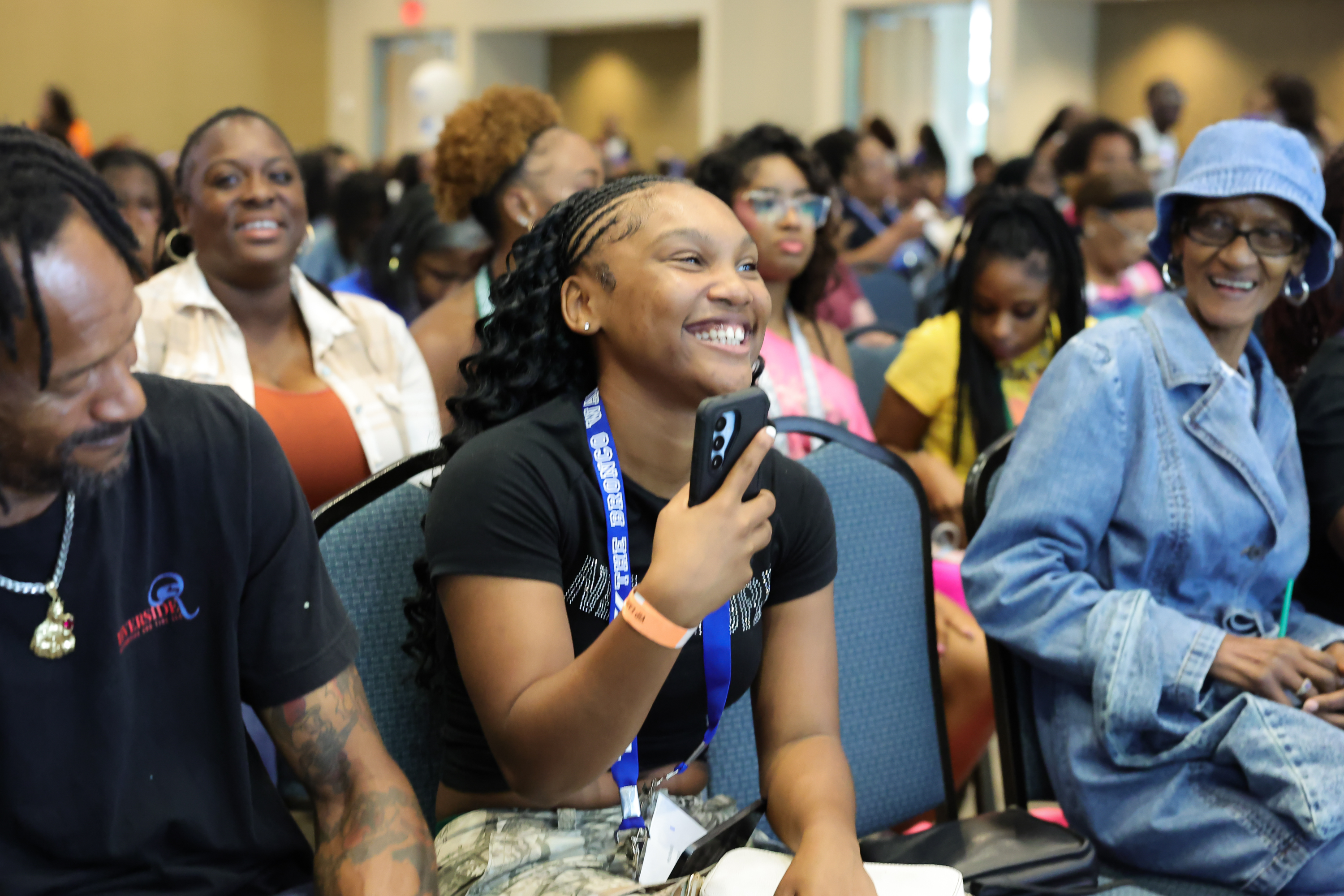 Two Bronco family members smiling together at a Fayetteville State University family event