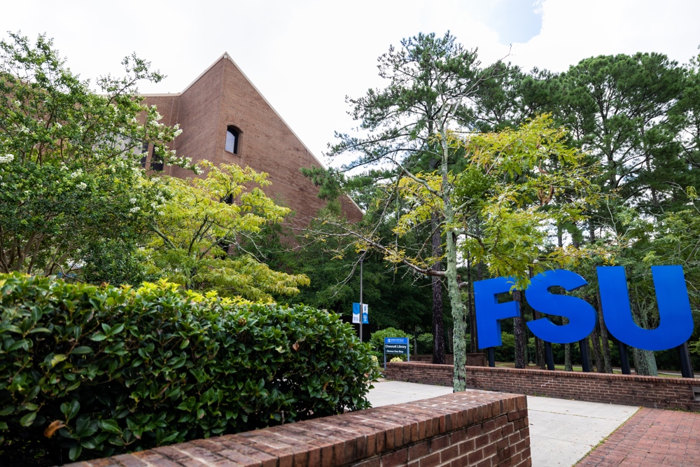 A picture of FSU's campus with the FSU sign displayed.