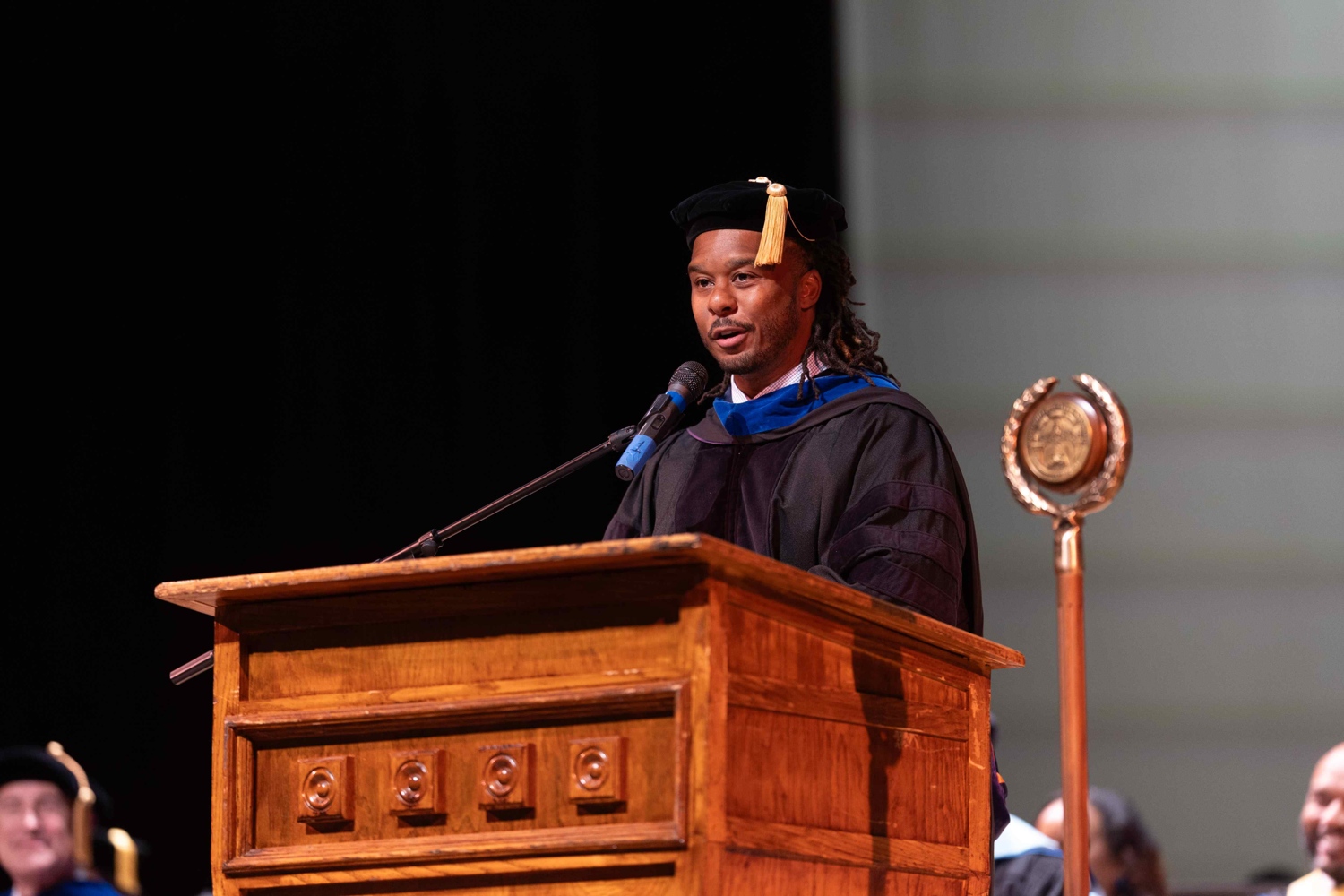 Jermain Coble speakign at convocation.