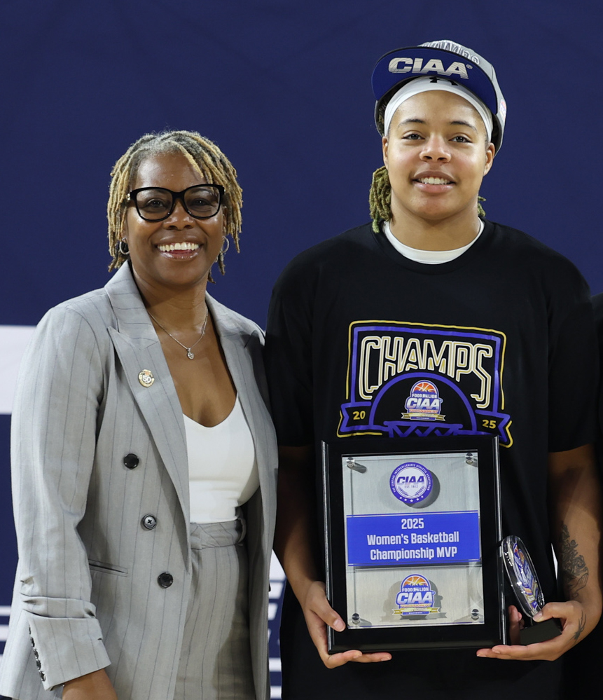 Nyah Wilkins with CIAA Commissioner after winning CIAA Tournament MVP