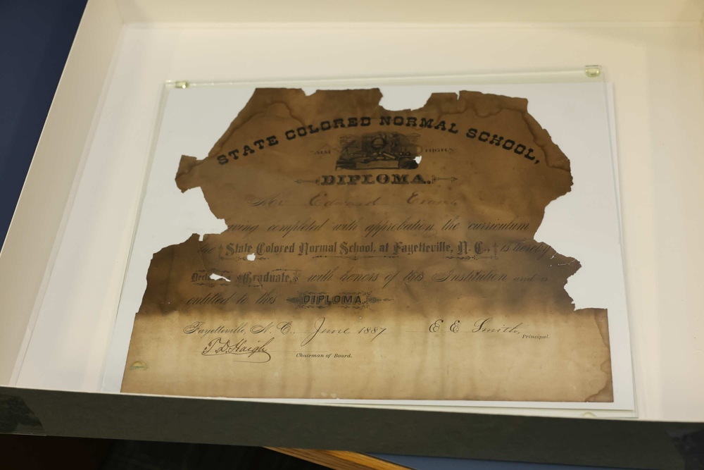 A diploma from 1887, yellowed and worn with age.