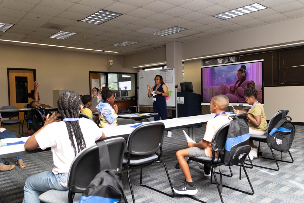 An instructor teaching children.