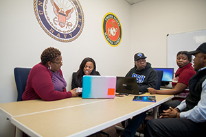 Student uses laptop for online classes