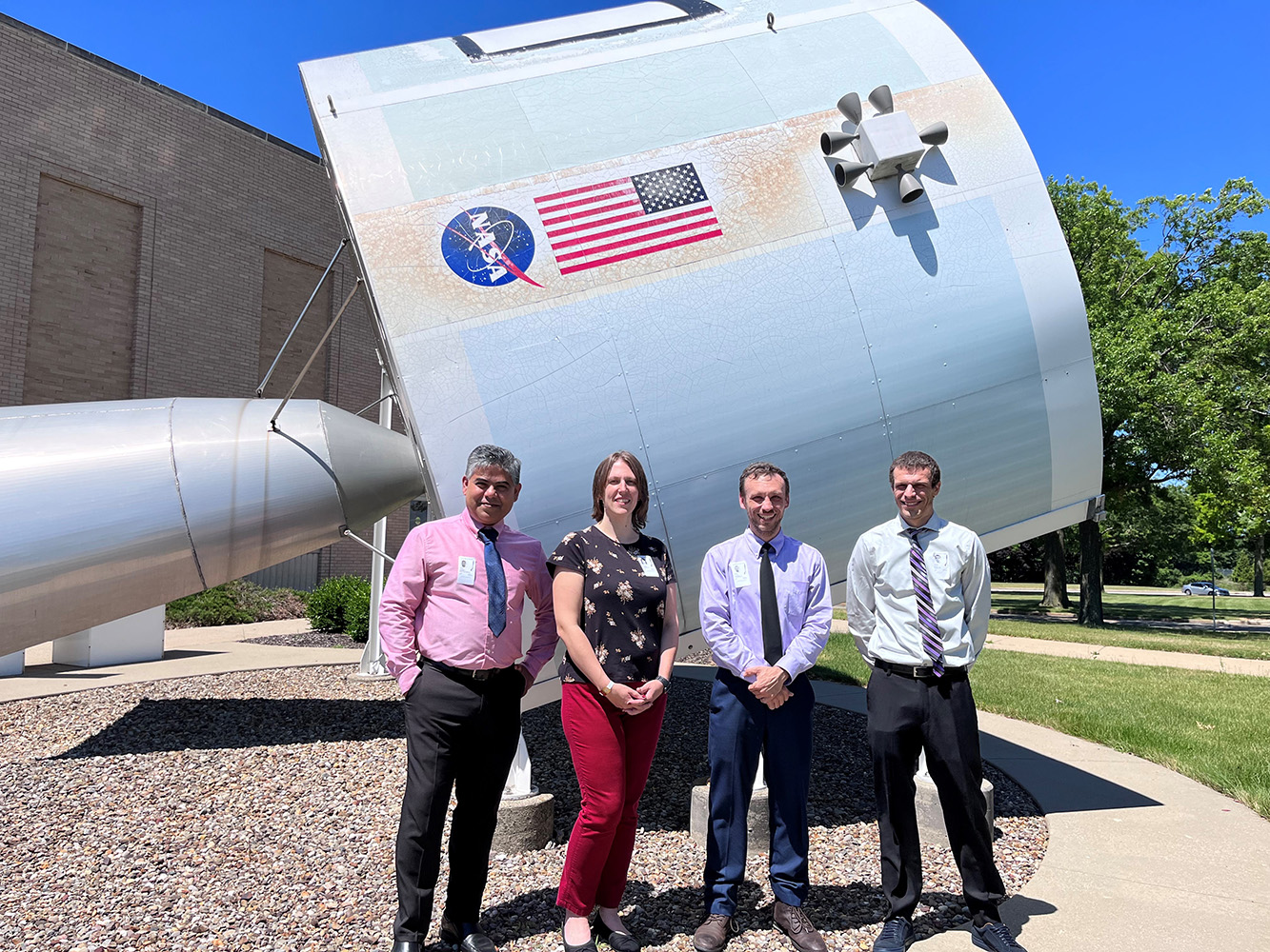 NASA Design Competition winners (l to r): Dr. Sambit Bhattacharya, Laura DeSantis, Chris Arsenault and Kyle Schultz at NASA’s Glenn Research Center.