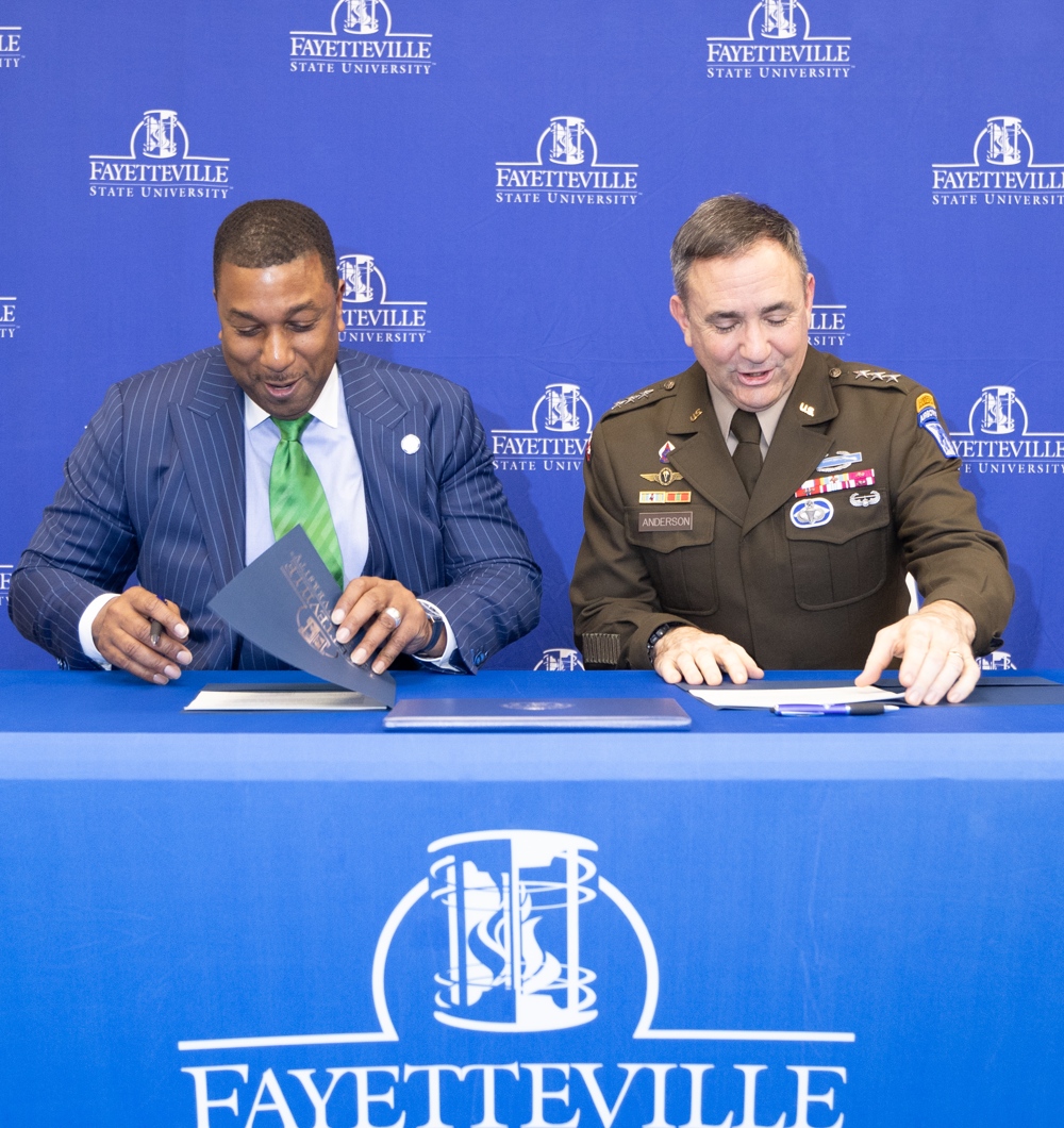 The chancellor standing with General Anderson.