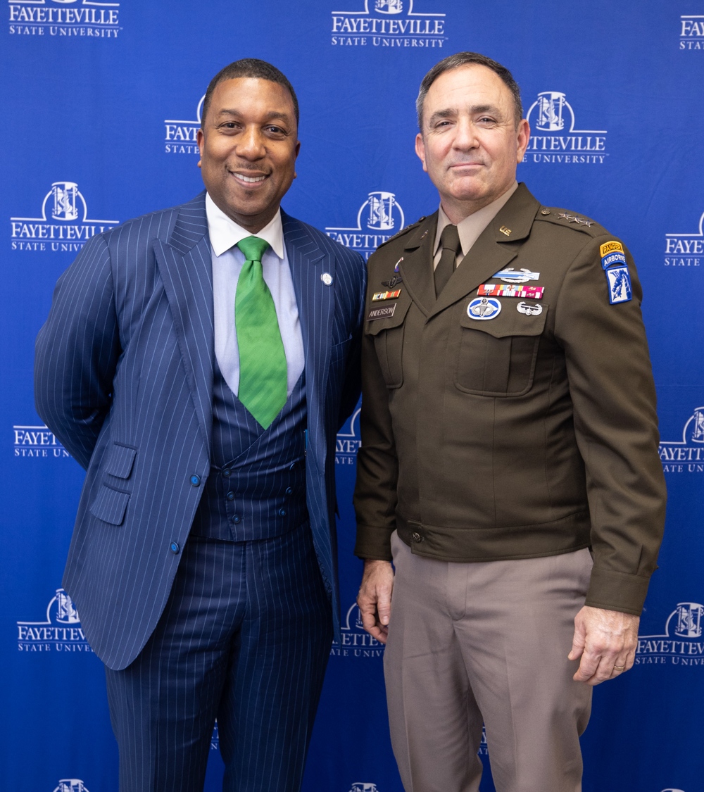 The chancellor standing with General Anderson.