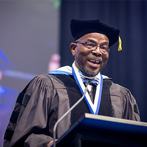 Dr. Robert Taylor delivering keynote address at 2023 Winter Commencement